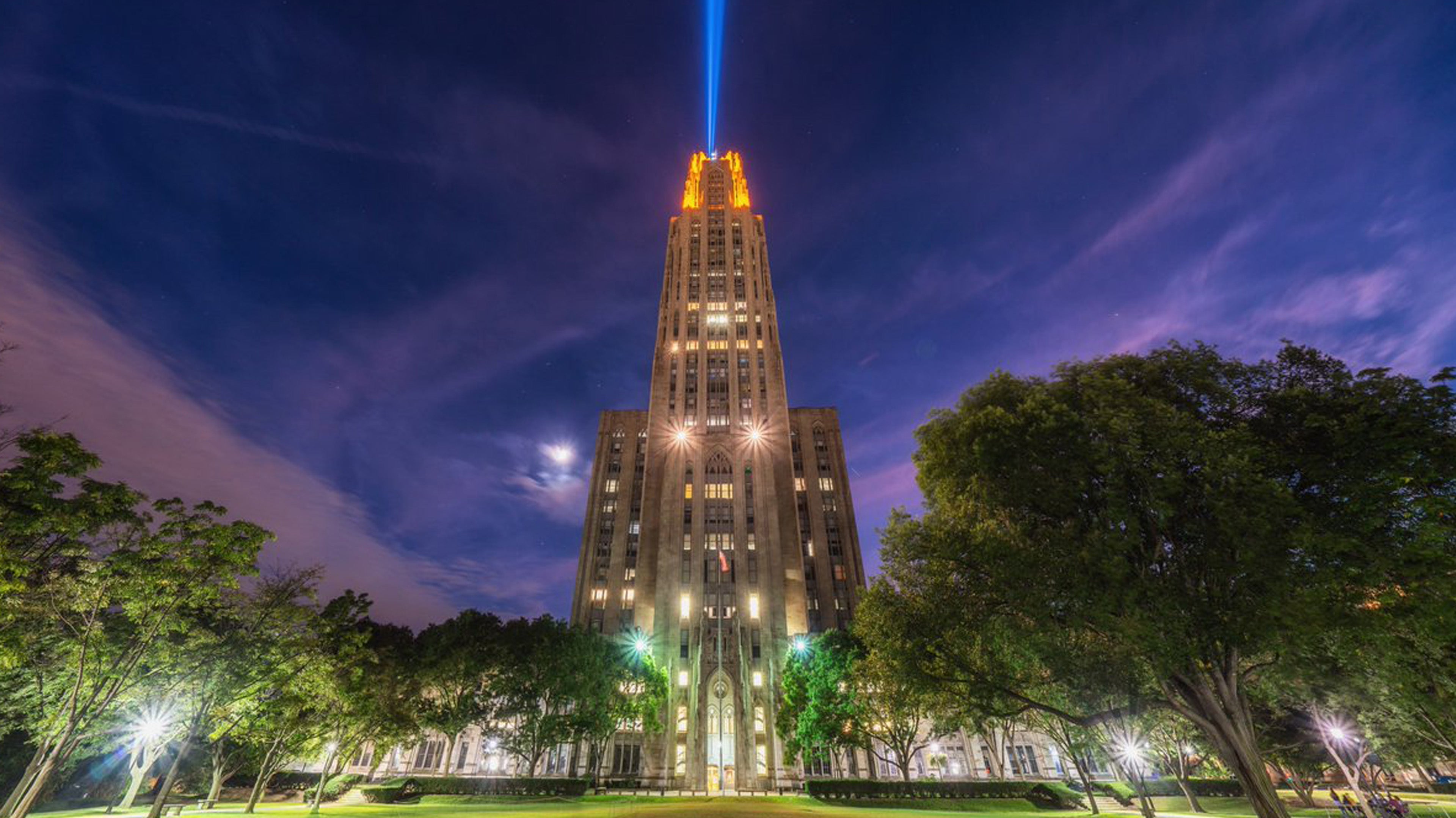 4K Desktop Wallpaper of the Cathedral of Learning with victory lights